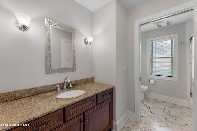 full bathroom with bathing tub / shower combination, toilet, and vanity