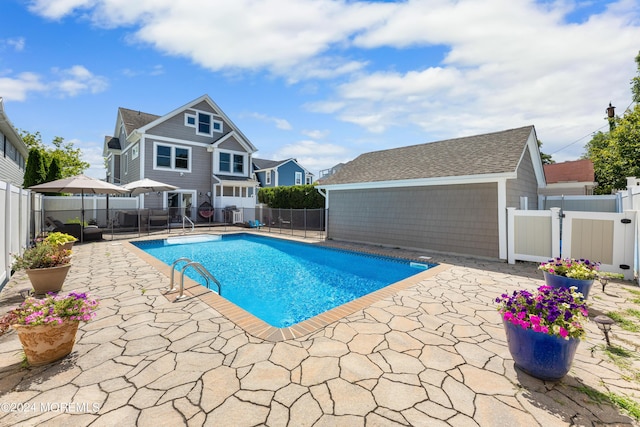 view of swimming pool with a patio