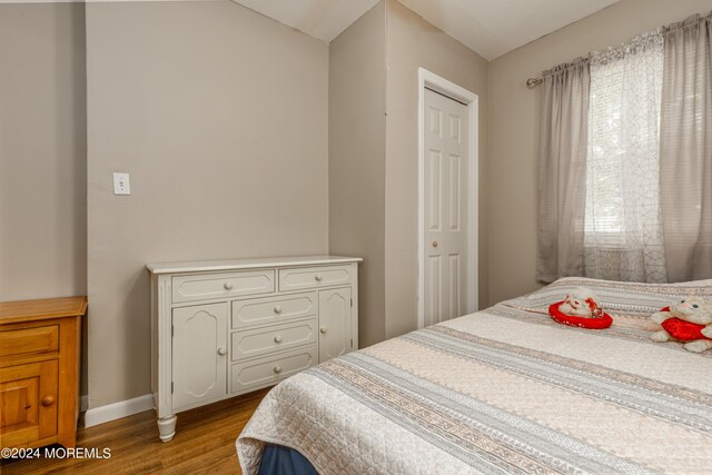 bedroom with light wood-type flooring