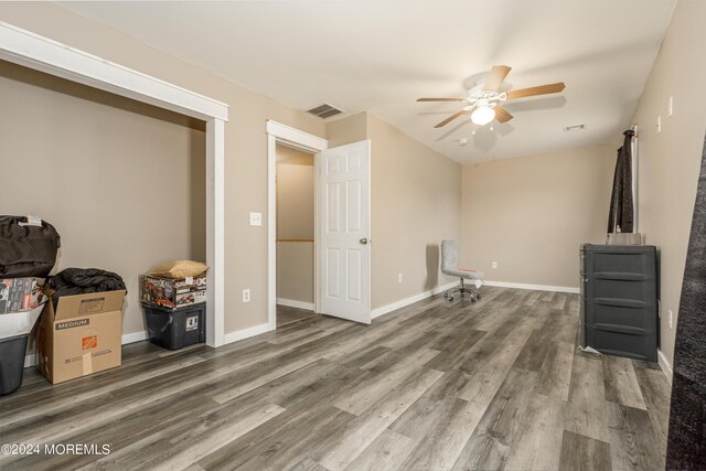 bedroom featuring ceiling fan and wood-type flooring