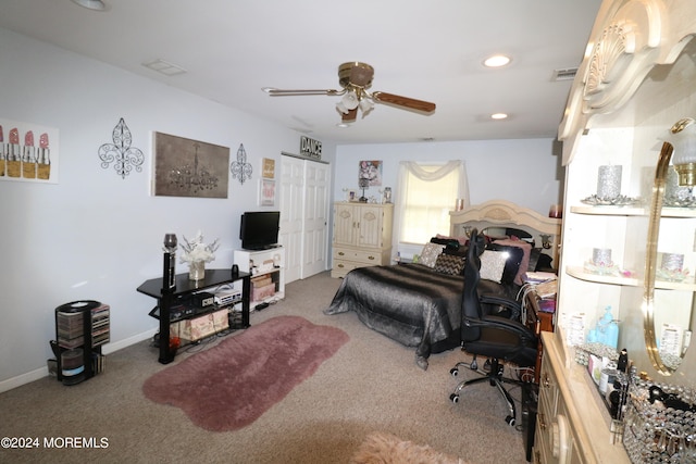 carpeted bedroom featuring ceiling fan