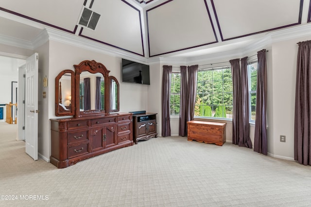 bedroom with crown molding and light colored carpet