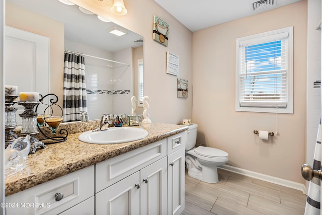 full bathroom with curtained shower, toilet, baseboards, and visible vents