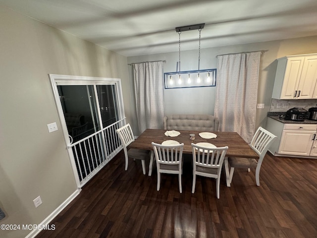 dining room featuring dark hardwood / wood-style flooring