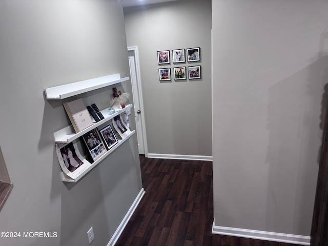 hallway featuring dark hardwood / wood-style flooring