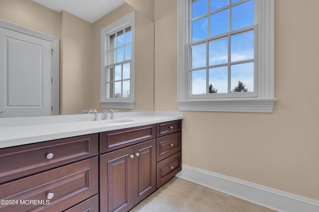 bathroom featuring vanity and tile patterned flooring