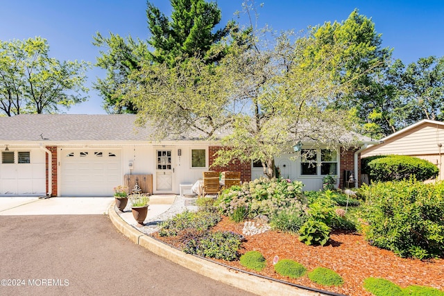 single story home with a garage