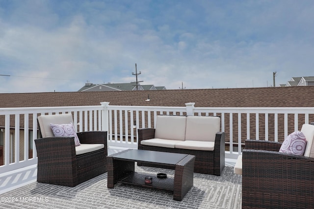 wooden deck featuring outdoor lounge area