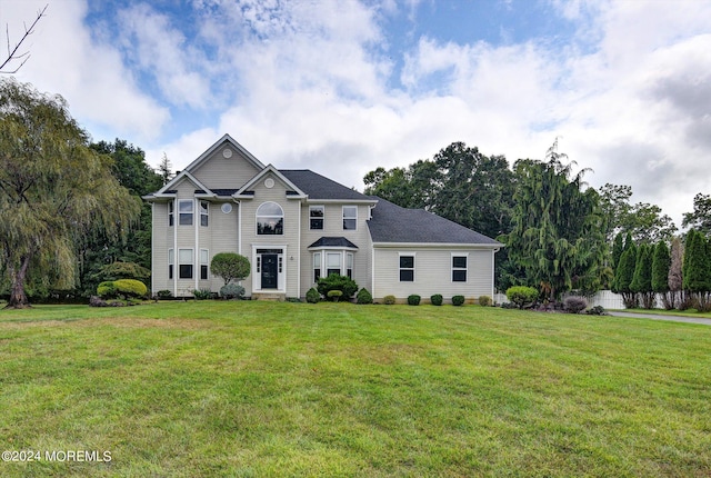 view of front of home with a front yard