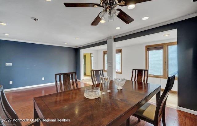 dining space featuring recessed lighting, baseboards, and wood finished floors