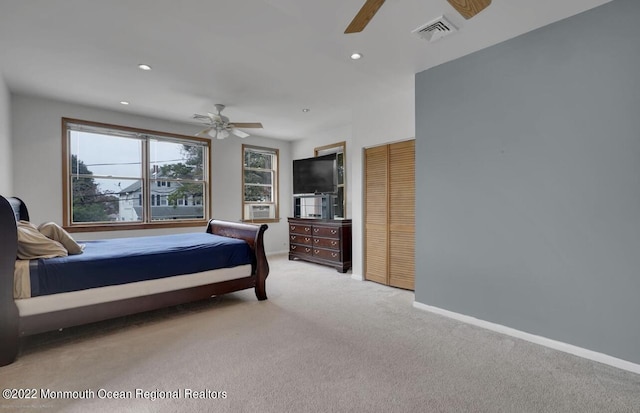 bedroom featuring visible vents, baseboards, light carpet, recessed lighting, and a ceiling fan