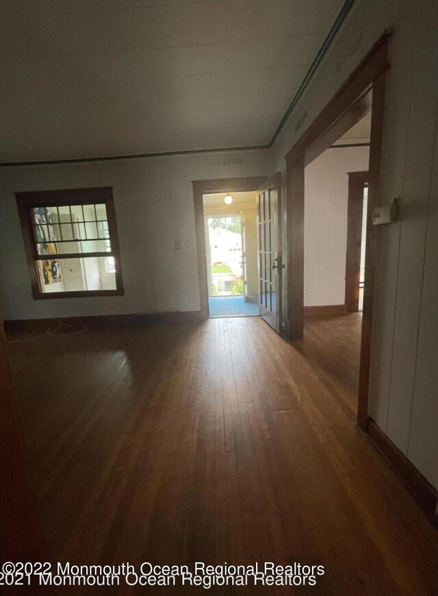 unfurnished room featuring hardwood / wood-style floors