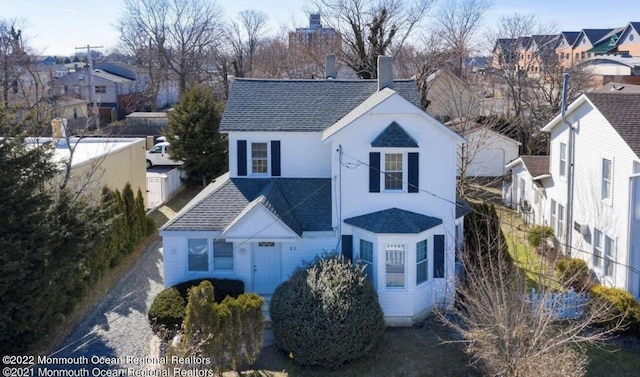52 Liberty St, Long Branch, NJ 07740 - traditional-style home with roof with shingles, a residential view, and a chimney