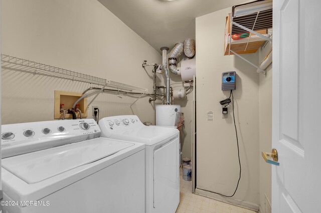 washroom with separate washer and dryer