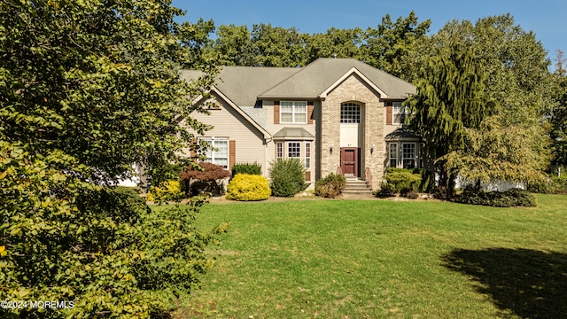 view of front facade with a front yard