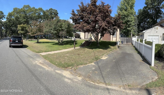 view of front of property with a front lawn