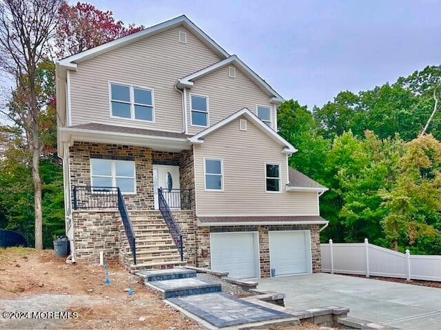 view of front of property with a garage