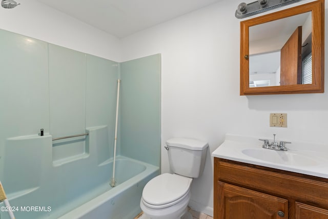 full bathroom with tub / shower combination, vanity, and toilet