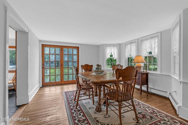 dining area with light wood-type flooring