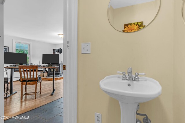 bathroom featuring hardwood / wood-style floors and sink