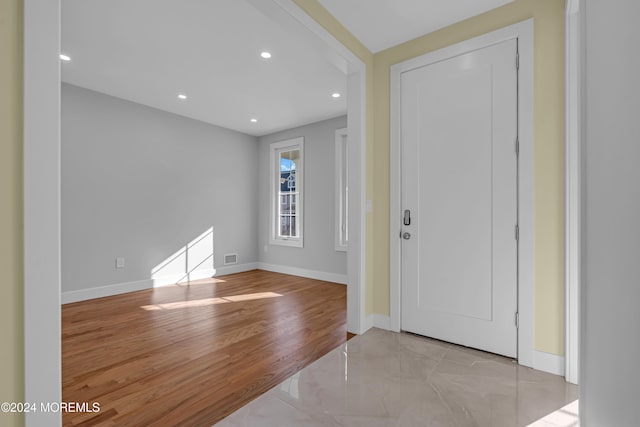 foyer entrance featuring light hardwood / wood-style flooring