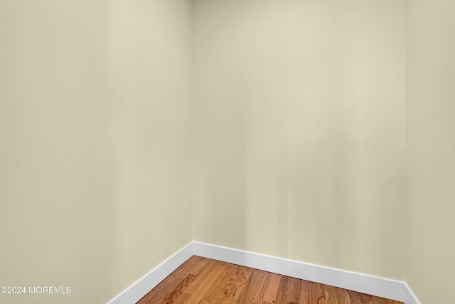 empty room featuring hardwood / wood-style floors