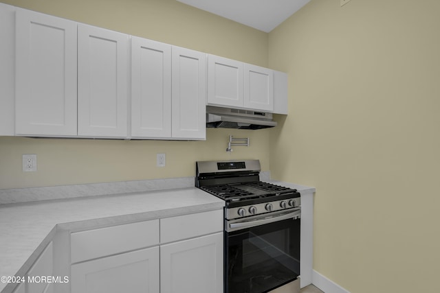 kitchen with white cabinetry and stainless steel gas stove