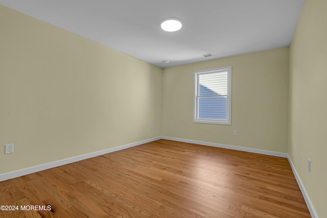 empty room with light wood-type flooring