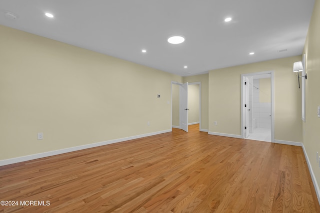 empty room with light hardwood / wood-style floors