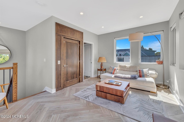 living room featuring light parquet flooring