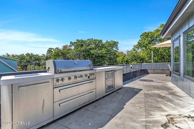 view of patio with exterior kitchen