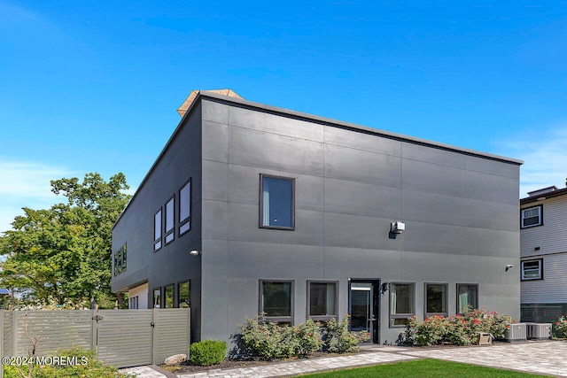 view of front of home featuring central AC unit