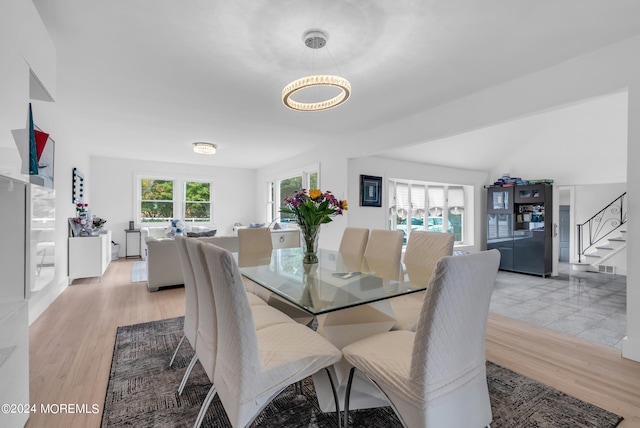 dining area with light hardwood / wood-style flooring