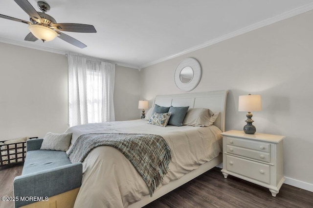 bedroom featuring dark wood-style floors, crown molding, baseboards, and ceiling fan