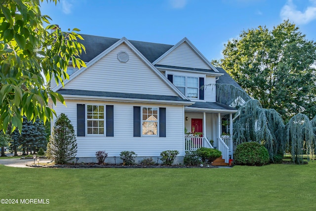 view of front of house featuring a porch and a front lawn