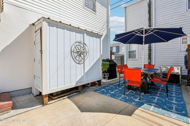 view of patio featuring outdoor dining space