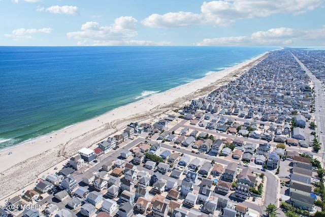 aerial view of property and surrounding area with extended coastline
