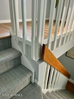 19 Coronado Rd, Lavallette, NJ 08735 - staircase featuring baseboards