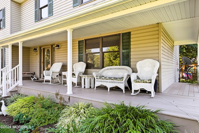 wooden terrace featuring a porch