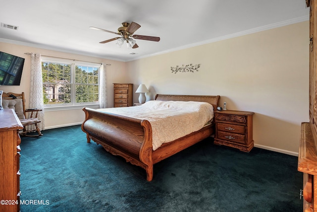 bedroom with crown molding, dark carpet, and ceiling fan