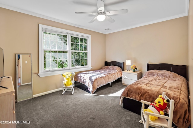 carpeted bedroom with ornamental molding and ceiling fan