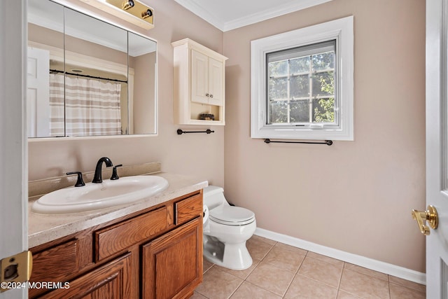 bathroom featuring ornamental molding, tile patterned floors, vanity, and toilet