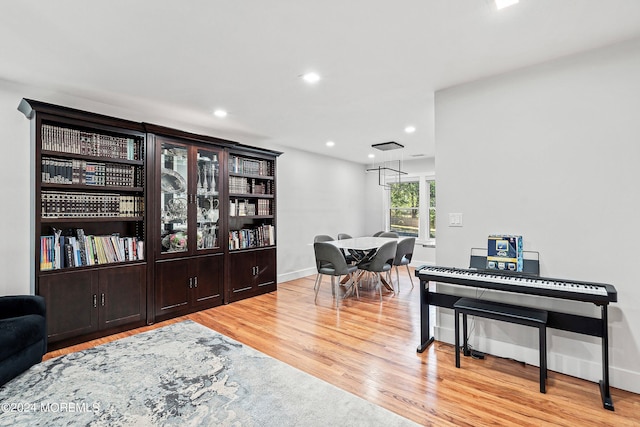 sitting room featuring light hardwood / wood-style floors