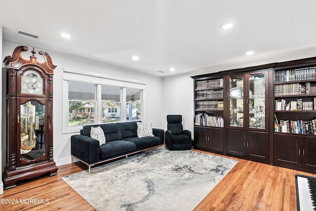 living room with light hardwood / wood-style flooring