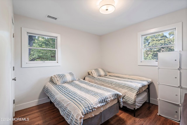 bedroom featuring dark hardwood / wood-style floors