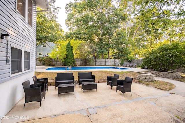 view of patio with a fenced in pool