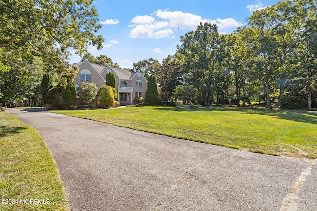 view of front of home with a front lawn