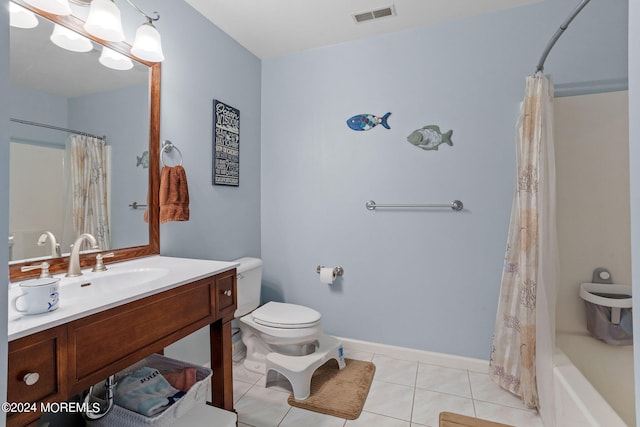 full bathroom featuring tile patterned flooring, vanity, toilet, and shower / bath combo with shower curtain