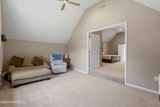 sitting room featuring carpet flooring, ceiling fan, and vaulted ceiling