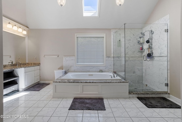 bathroom with tile patterned flooring, vanity, lofted ceiling with skylight, and plus walk in shower